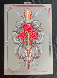Red flowers and pinstripes on gray panel