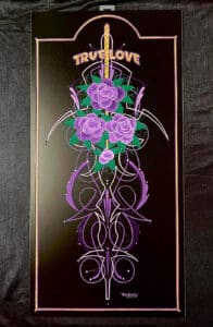 True Love with 3 purple flowers and pinstripes on black panel