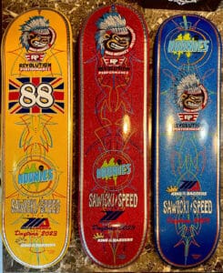 3 skateboard decks with Mad Monkey logos