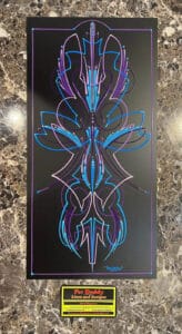 Blue and purple pinstriping on black panel