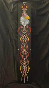 Eagle head and pinstripes on black panel