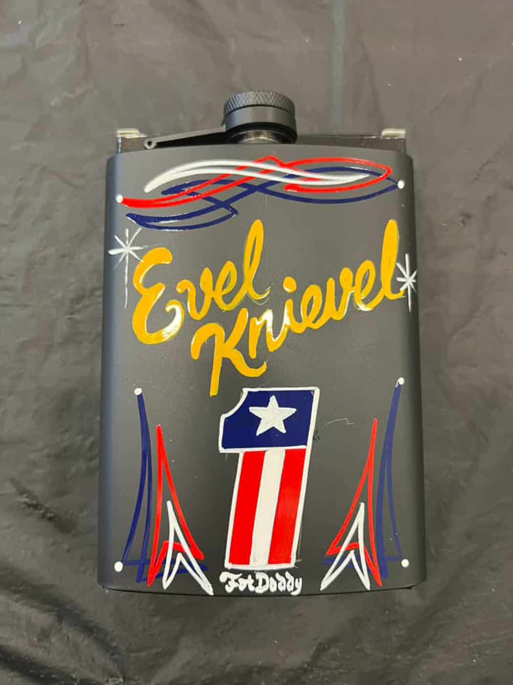 Evel Knievel and Harley 1 logo on can