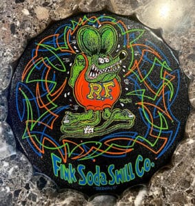 Rat Fink and pinstripes on bottle cap shaped tin