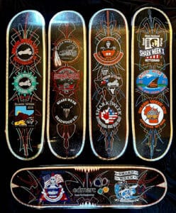 5 skateboard decks painted by Mark